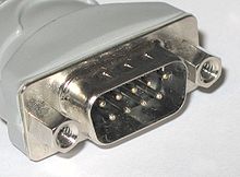 https://upload.wikimedia.org/wikipedia/commons/thumb/7/78/9_pin_d-sub_connector_male_closeup.jpg/220px-9_pin_d-sub_connector_male_closeup.jpg